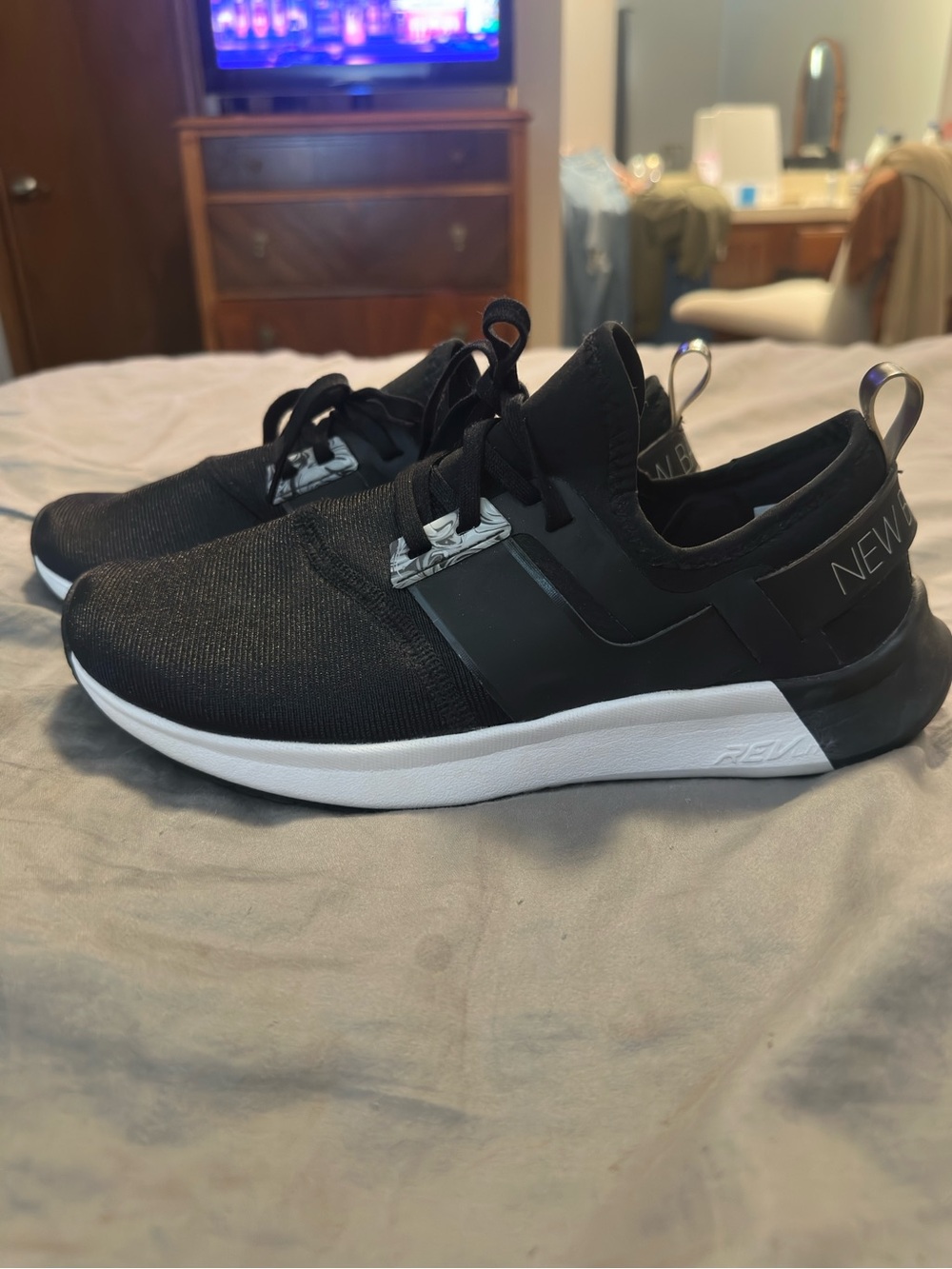 New Balance Black and White Slip-On Athletic Sneakers